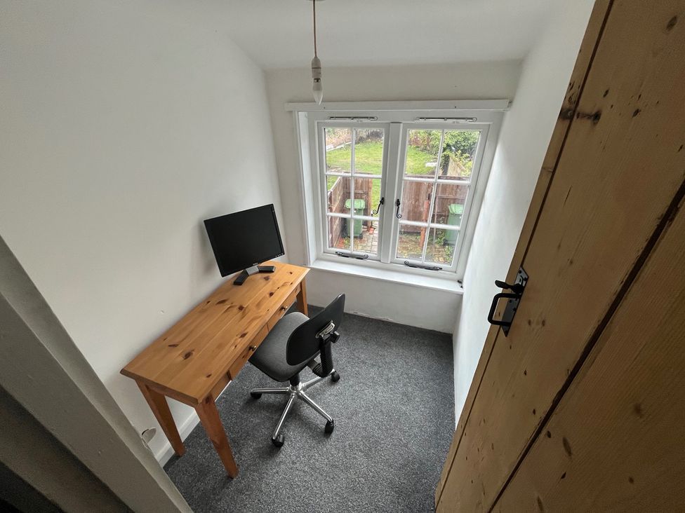 An office with a desk and computer at Historic Cottage on the Suffolk border, Harleston Norfolk