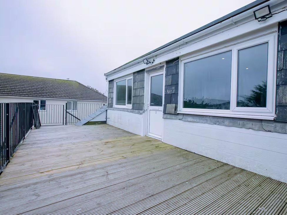 An outdoor area with a decking and railing at 1 Bedroom Apartment, sleeping 3 with balcony and pet friendly, Carbis Bay