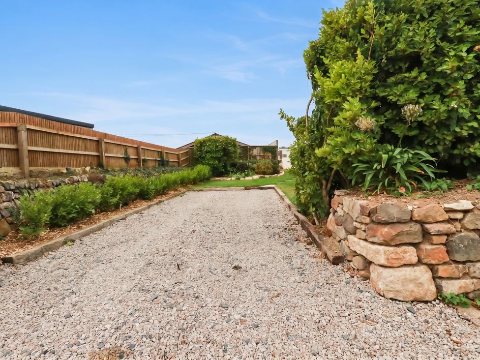 A gravel path leading through a garden at Rule retreat in Penzance