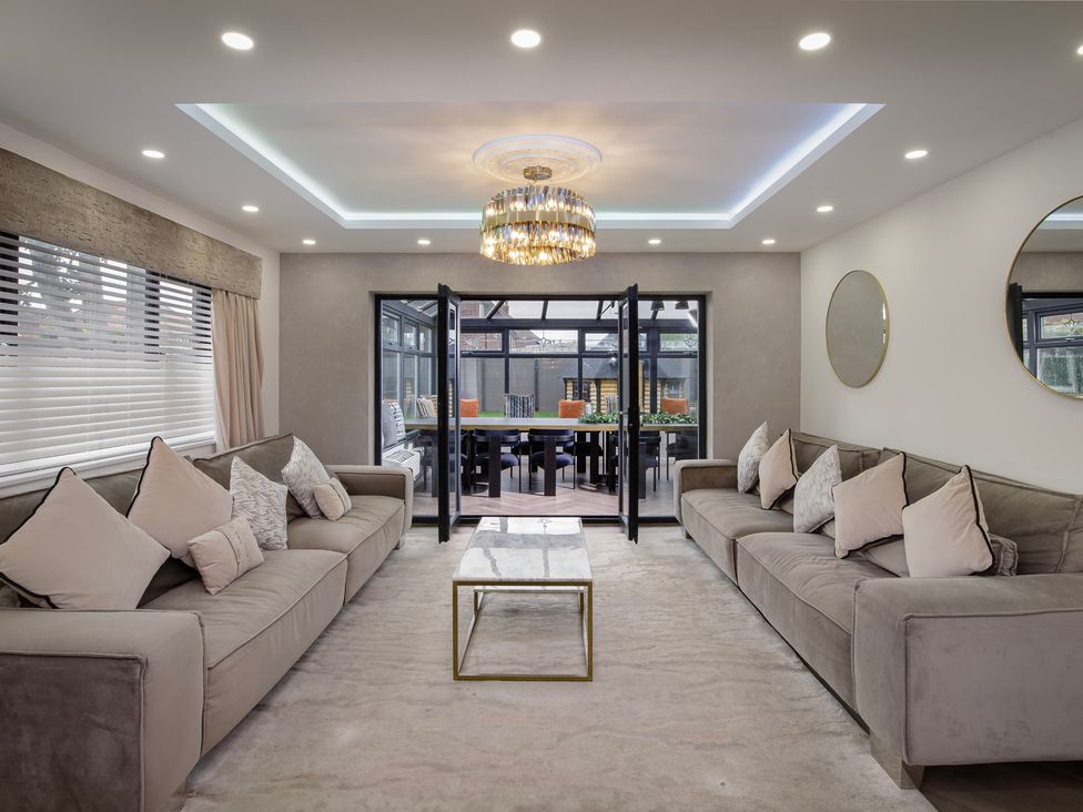 A living room with a coffee table and sofas at Wind Farm