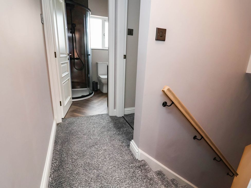 A bathroom with a shower and toilet at 9 North Street Chester