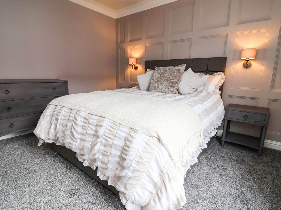 A bedroom with a bed and dressers at 9 North Street, Chester