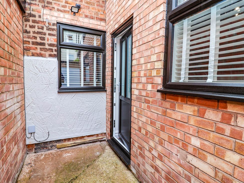 An exterior view with a door and window at 9 North Street Chester