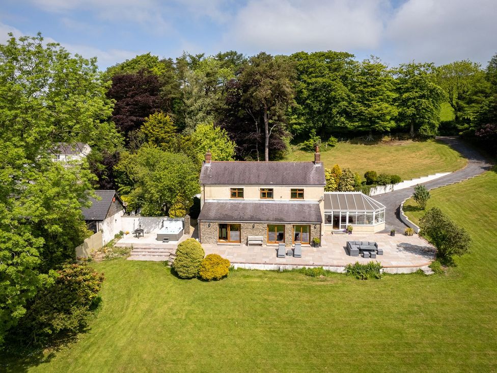 A house with a garden and patio at Blaenachddu in Newcastle Emlyn