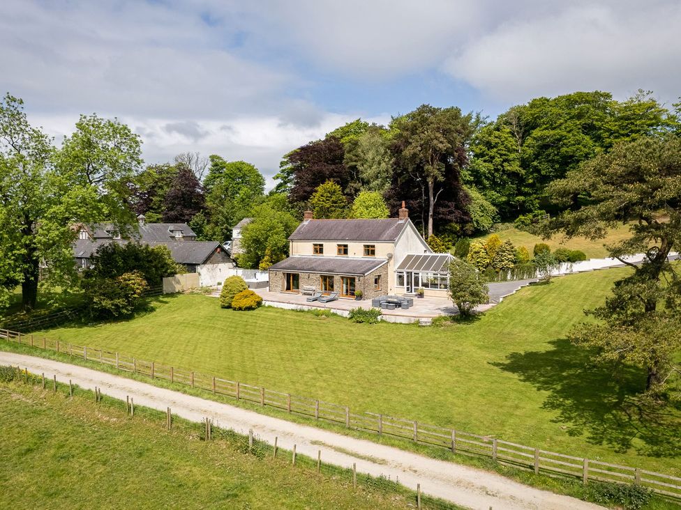 A house with a garden and decking at Blaenachddu in Newcastle Emlyn