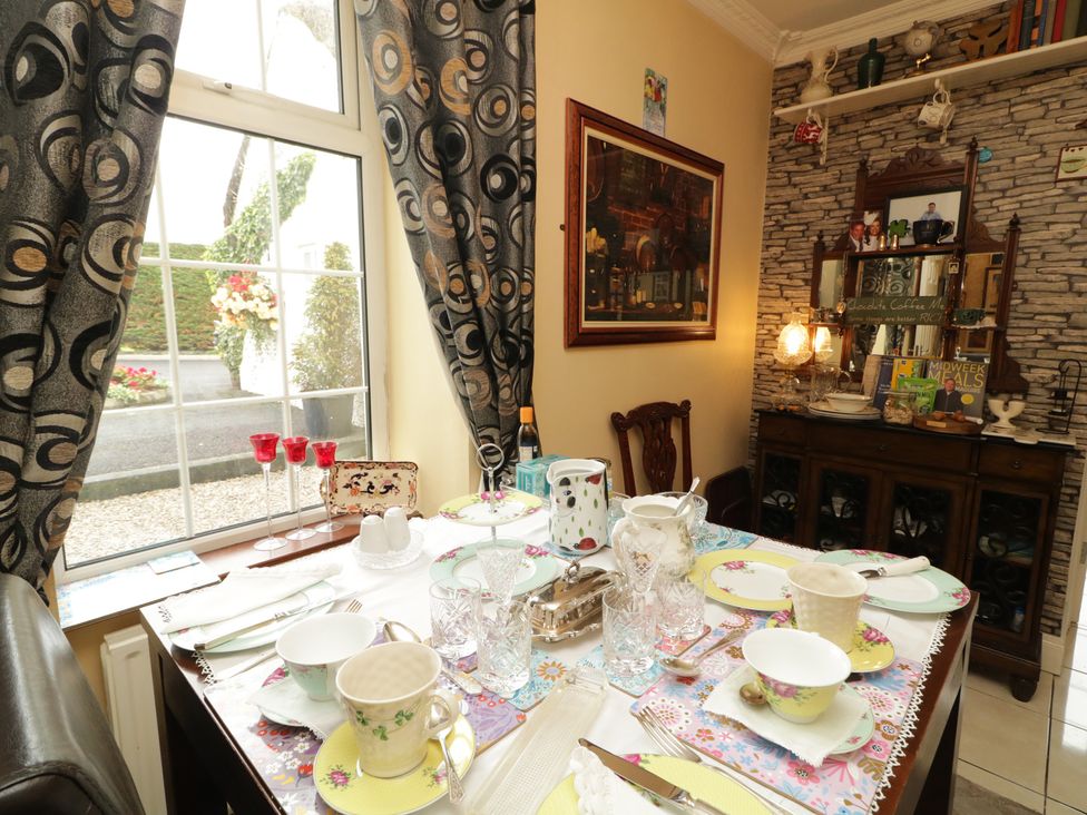 A dining room with a table set for tea at Bruckless Rest Fine Country Dining B&B, Bruckless