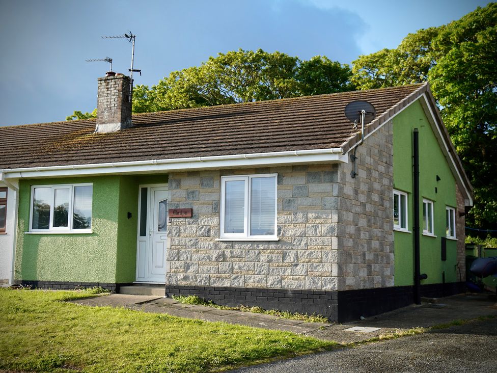 A house with a garden and chimney at Ty Marlyn St Davids