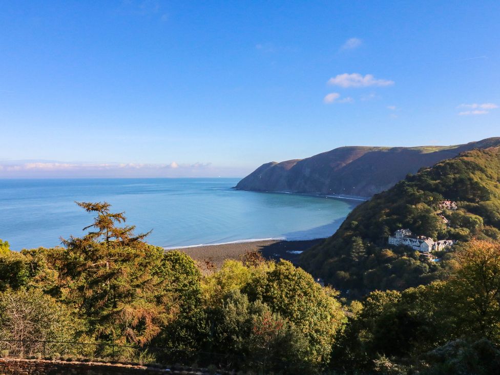 A view of the coastline with sea and hills at Myrtle Cottage in Lynmouth