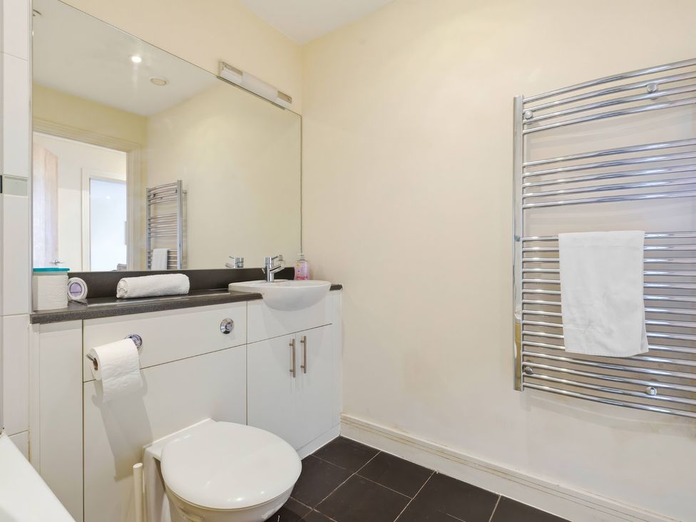 A bathroom with a sink and toilet at Apartment 28 in Birmingham