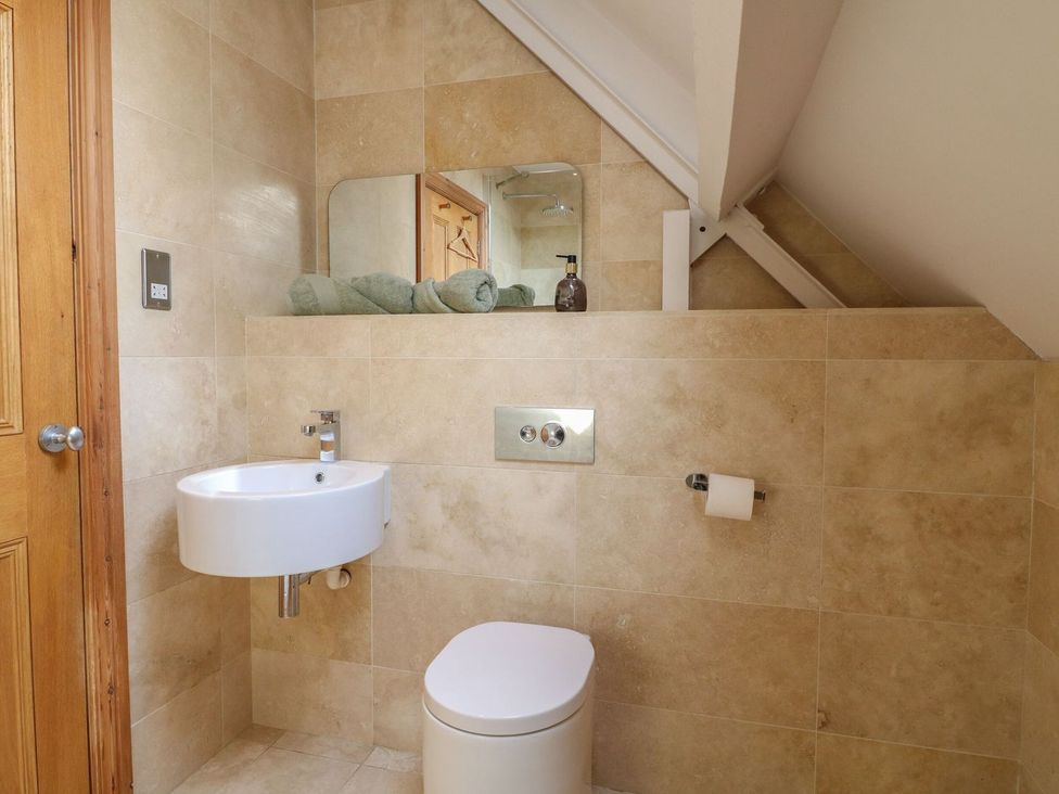 A bathroom with a sink and toilet at Old Print House in Ilkeston