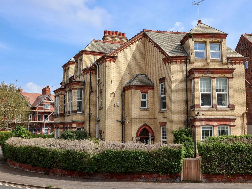An exterior view of a building with multiple windows at Trinity Lodge in Bridlington
