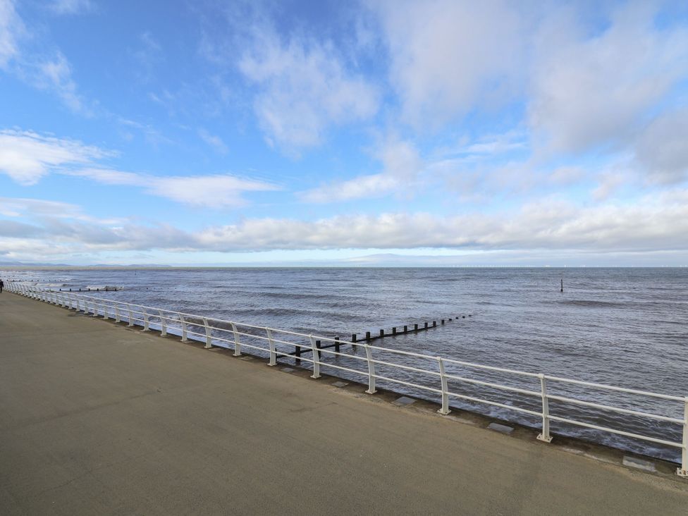 A view of the sea and sky with a pavement at Tidal Retreat in Rhyl