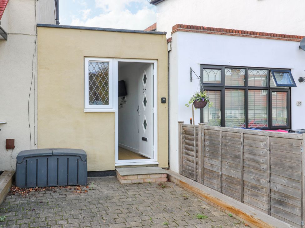 An outdoor entrance with a door and window at the Annex in Southend-On-Sea
