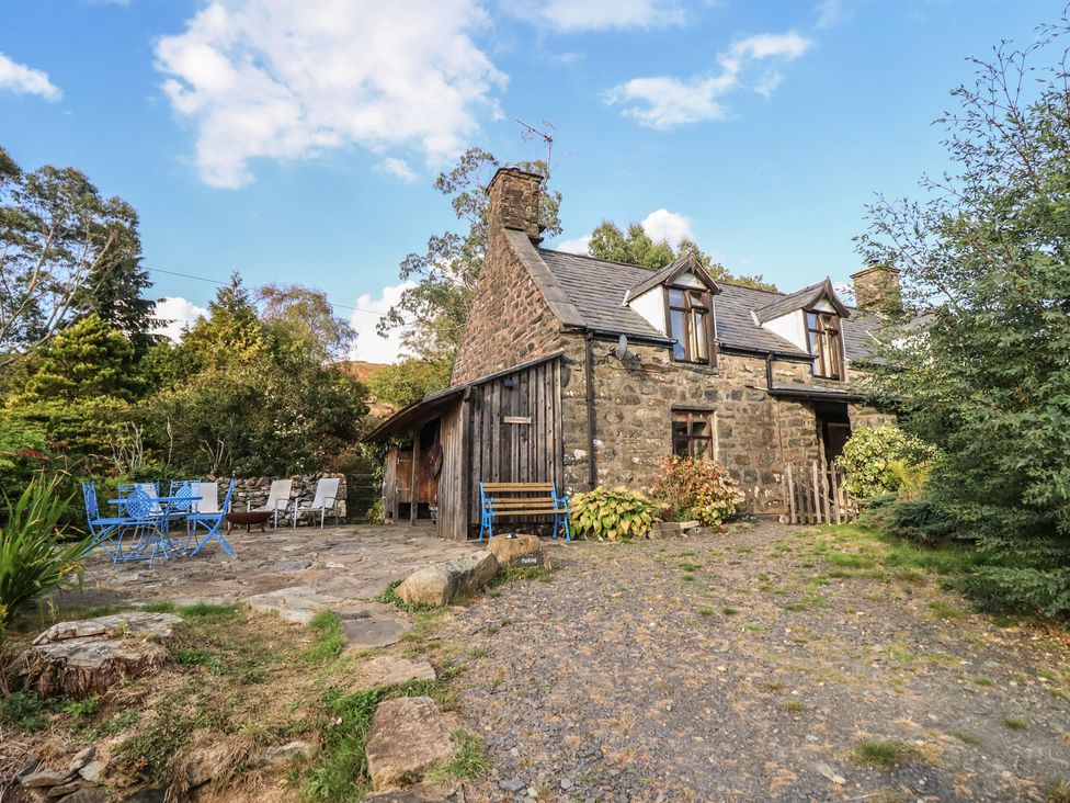 A house with outdoor seating and a pathway at Waen Fechan in Dolgellau