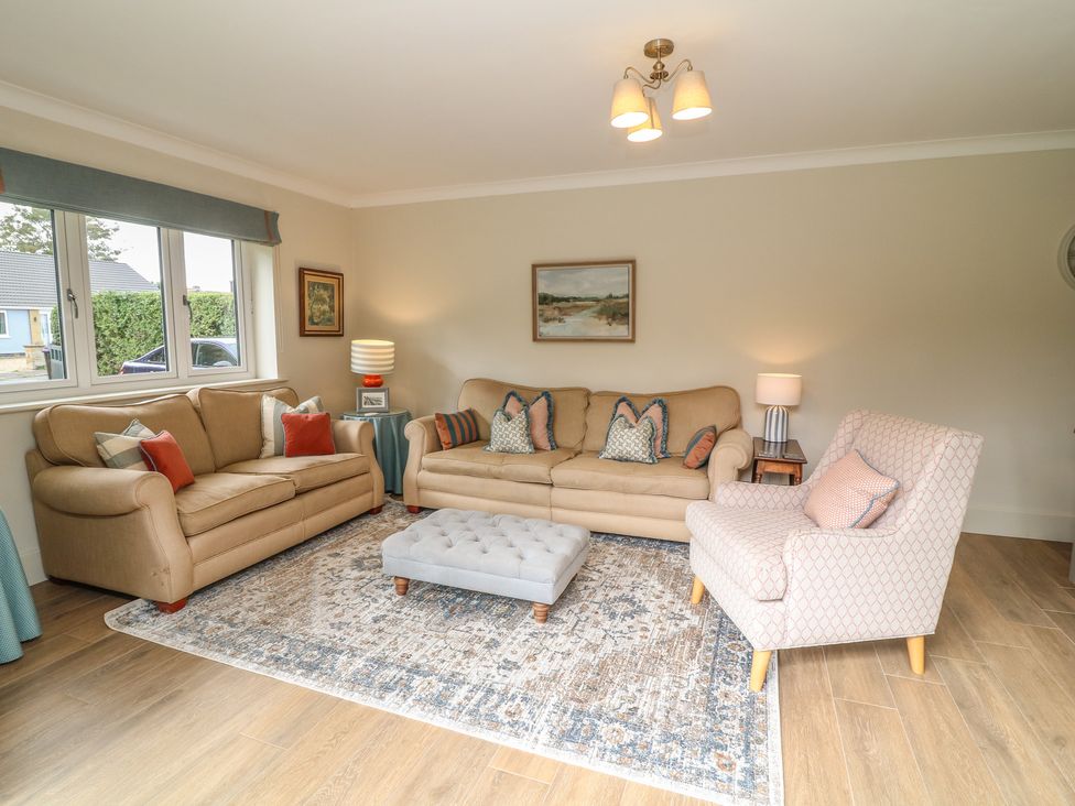 A living room with furniture and decor at The Willows in Mablethorpe