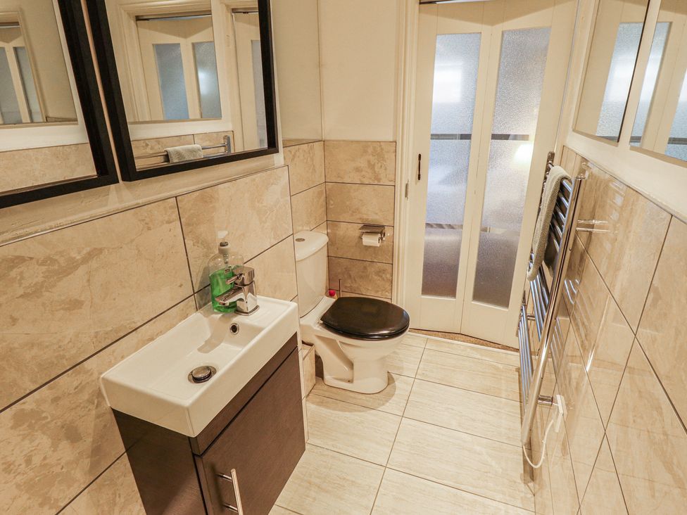 A bathroom with a sink and toilet at Apartment 173 Lincoln