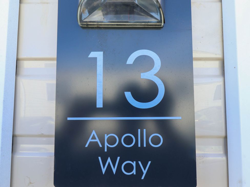 A street sign displaying number 13 and Apollo Way at Coastfields Holiday Village Ingoldmells
