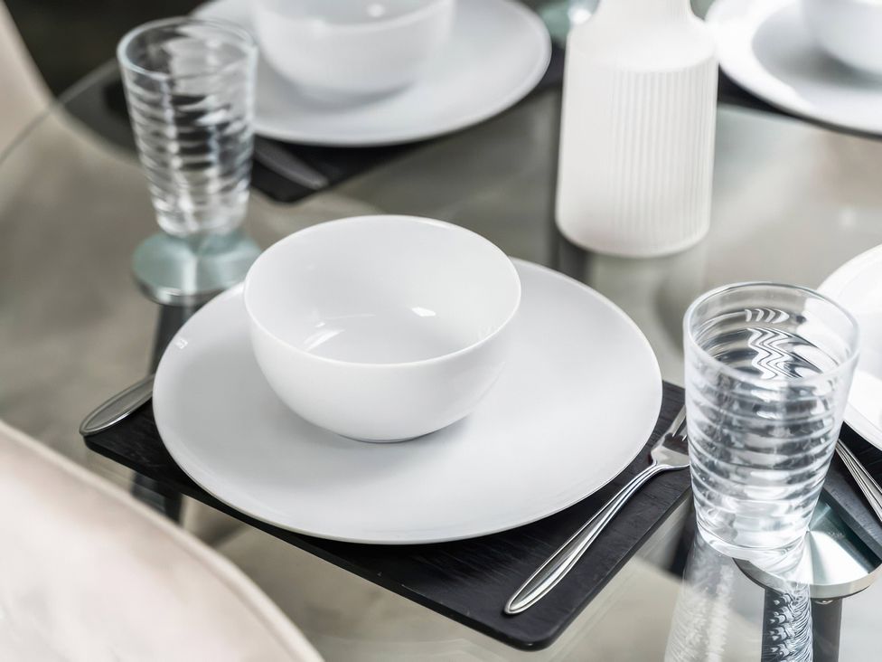 A dining table setting with a bowl and glass at Flat 6, Hilltop Court Uxbridge