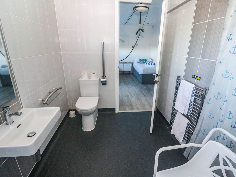 A bathroom with a sink and toilet at 74 Porthmeor in Redruth
