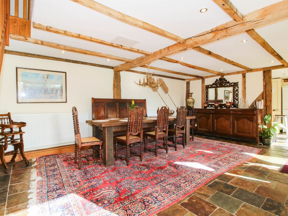 A dining room with a table and chairs at The Duck House at Hyssington Farm