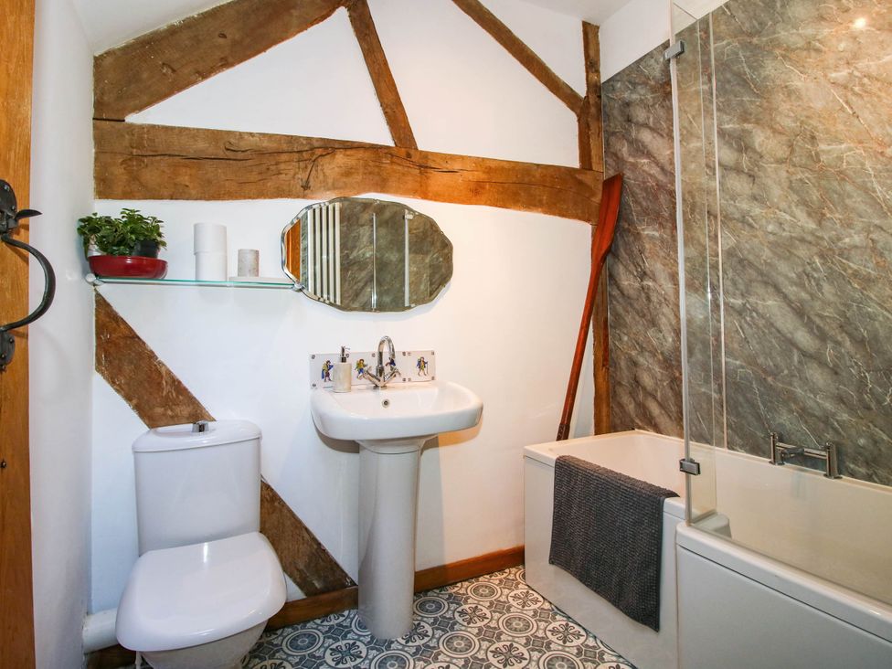 A bathroom with a sink and bathtub at The Duck House at Hyssington Farm near Montgomery