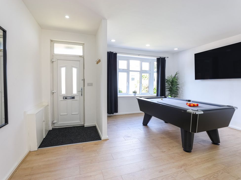 A game room with a pool table at 5 Woodland Crescent in Manchester