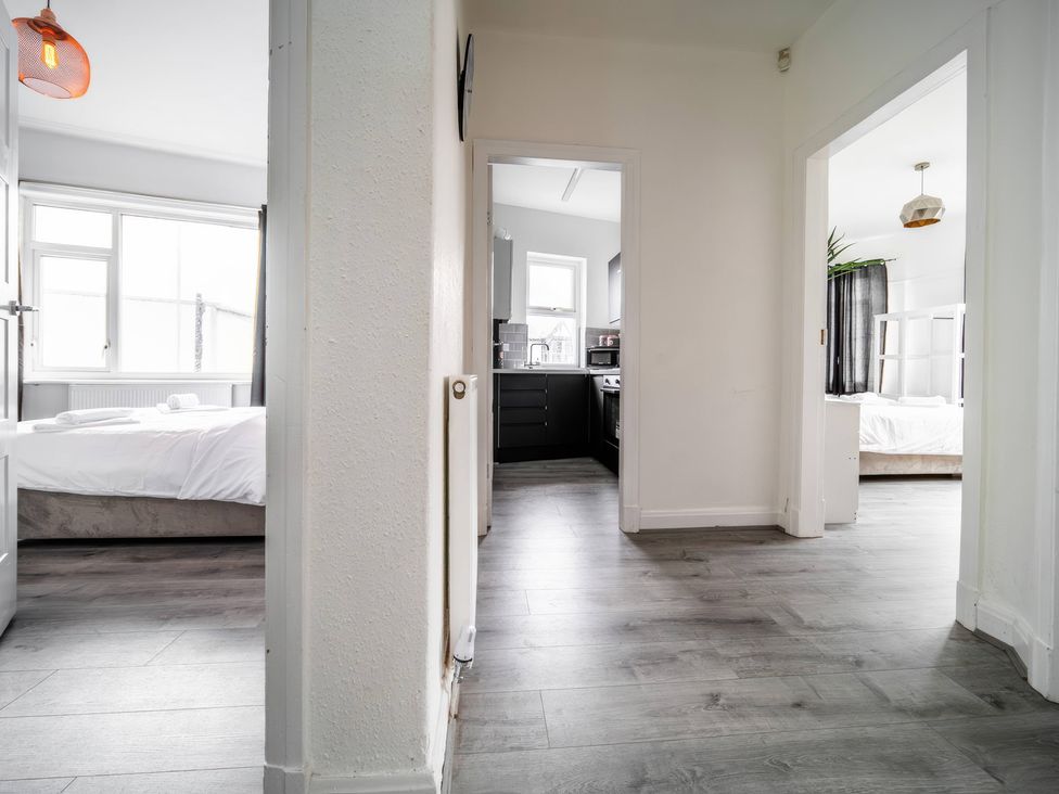 A hallway with a view of rooms at Flat with Terrace Style Rooftop in Thornton-Cleveleys