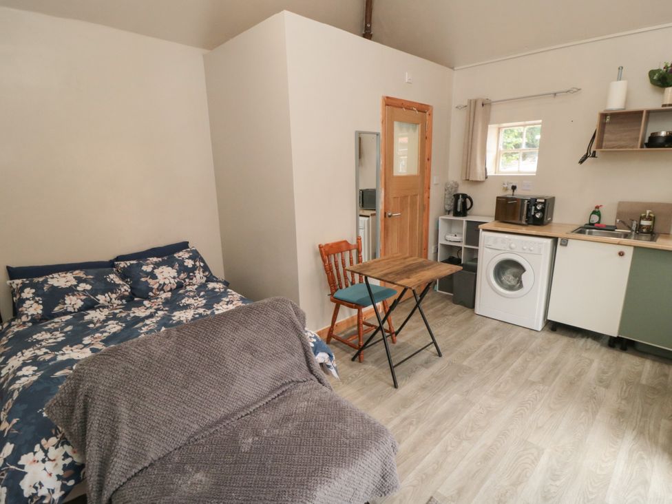 A studio with a bed and kitchenette at The Guest Room in Redcar