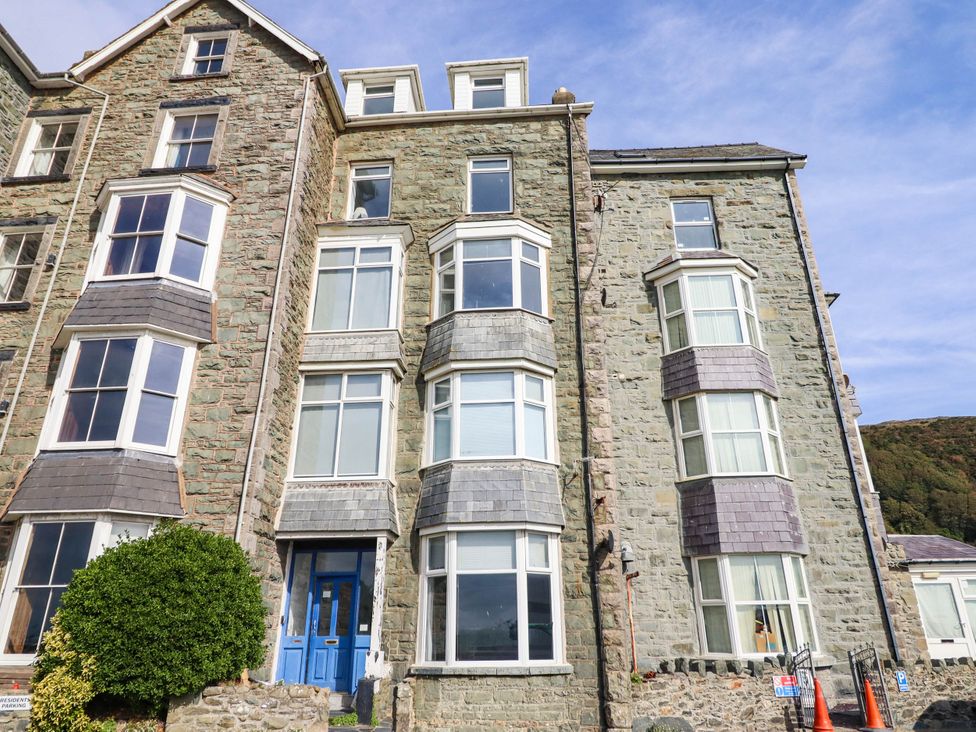 A building with stone exterior and multiple windows at Flat 4 Greenfields Barmouth