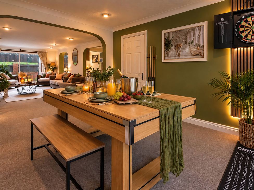 A dining room with a table set for drinks and fruit at 20A Westend Parade Gloucester