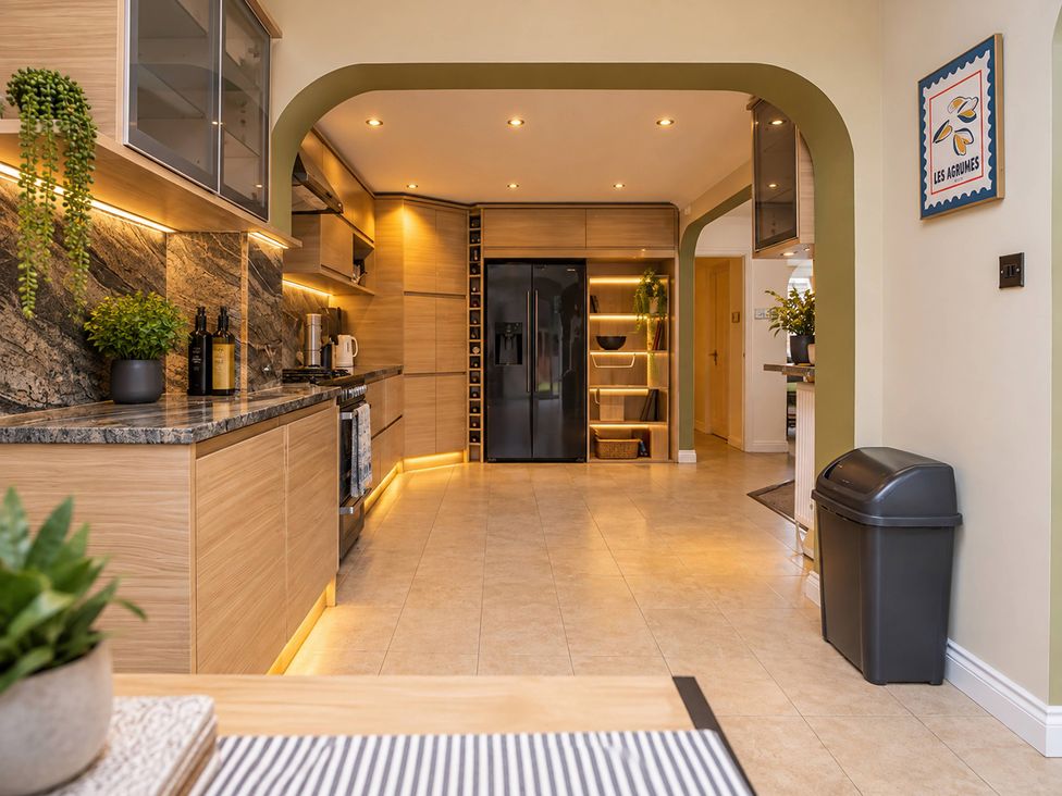 A kitchen with modern appliances and cabinetry at 20A Westend Parade in Gloucester