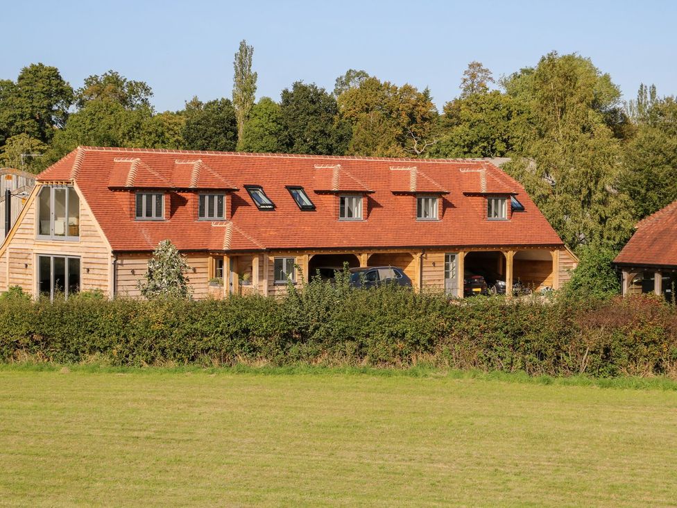 A house with a roof and windows at The Granary 2 Bed in Bordon