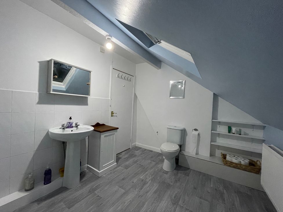 A bathroom with a sink and toilet at 9 Market View Buxton
