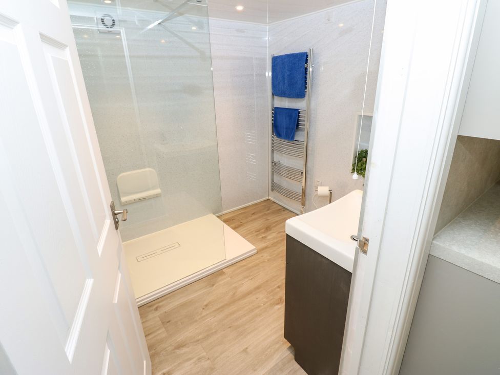 A bathroom with shower and sink at Gap Farm in Gilsland