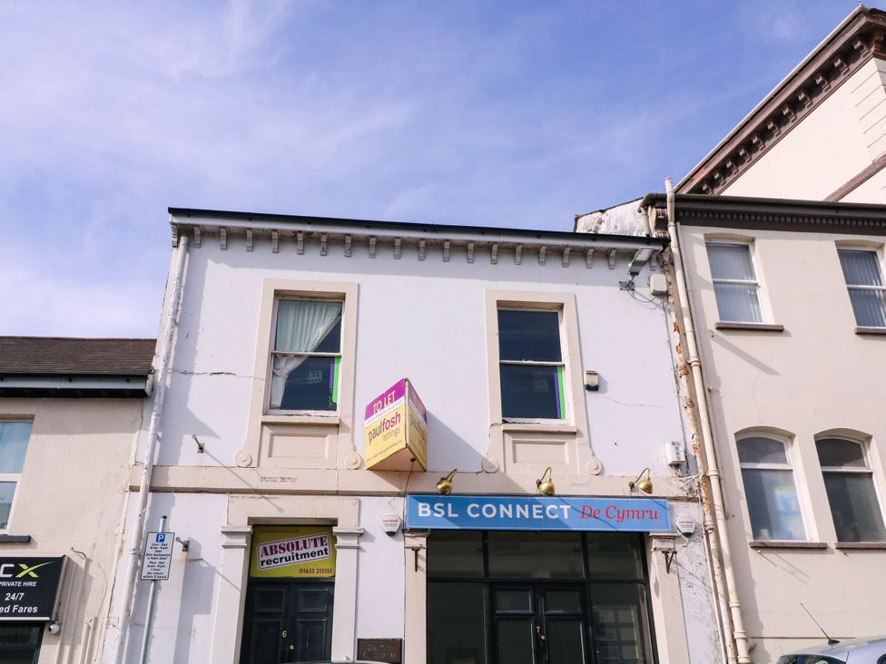 A building with signs for BSL Connect and recruitment services at 6 Caxton Place Newport, South Wales
