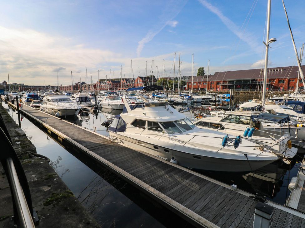 A marina with various boats at 21 Ferrara Square Swansea