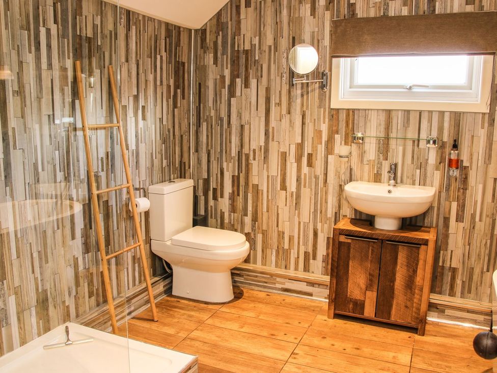 A bathroom with a sink and toilet at The Half Boar in Bishop's Castle