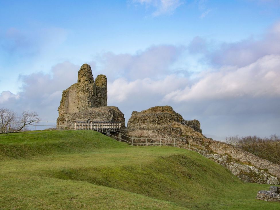 Castle ruins on grassy hill at The Half Boar in Bishop's Castle