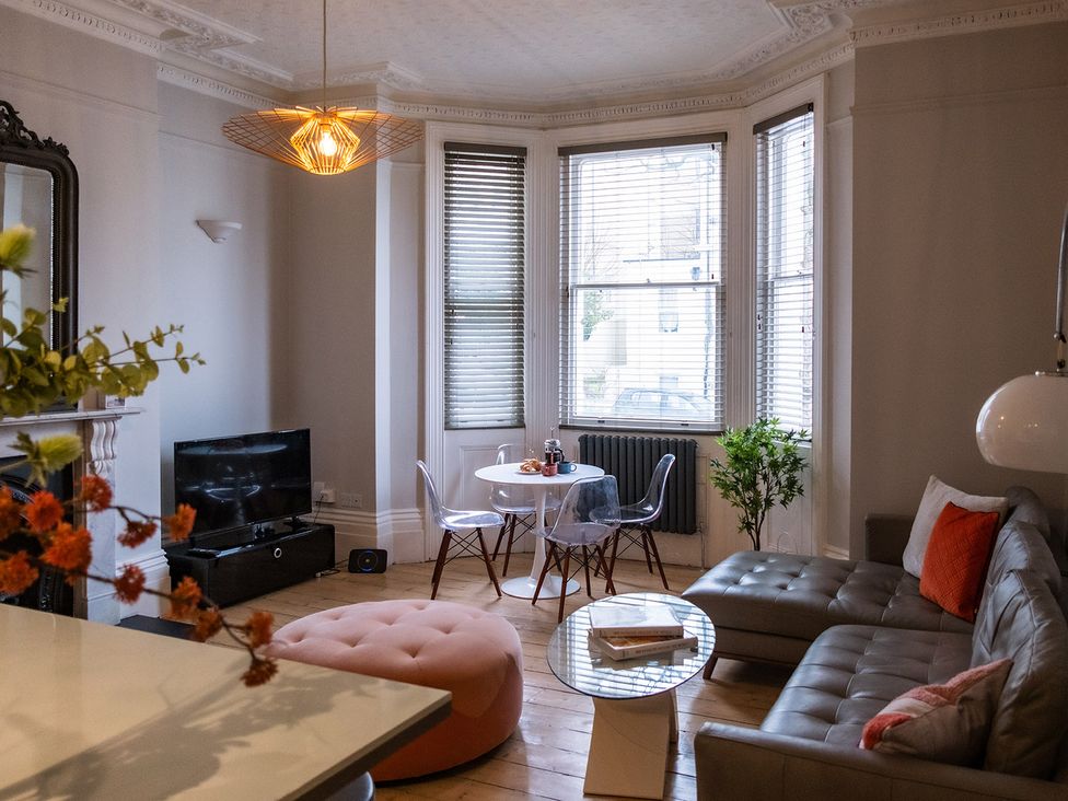 A living room with a sofa and coffee table at Gorgeous 2Bed Apartment with Patio in Brighton And Hove