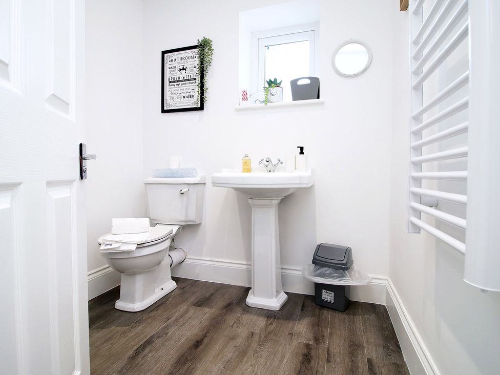 A bathroom with a sink and toilet at 2 bed Cardiff city centre apartment Cardiff