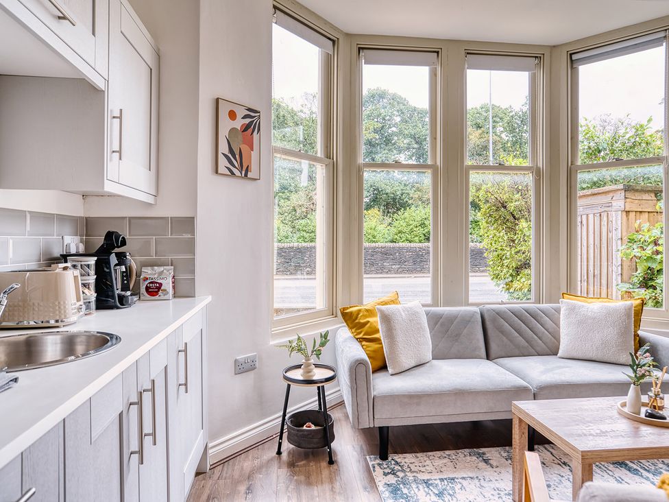 A living room with a sofa and coffee table at Stunning 2 Bed by the City Centre and Bute Park, Cardiff