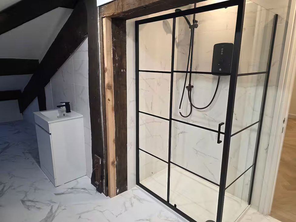A bathroom with a shower enclosure and a sink at Liverpool Penthouse, sleeps 8, Liverpool