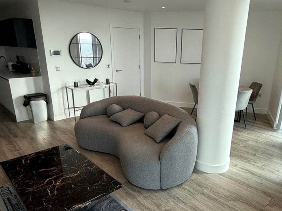 A living room with a sofa and coffee table at 3 Bed Apartment, sleeping 6 with Wifi in Manchester
