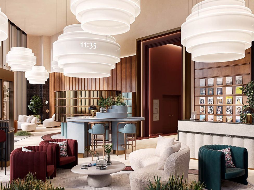 A lobby with chandeliers and seating area at Central Apartment with Free Parking, Terrace and Gym in Manchester