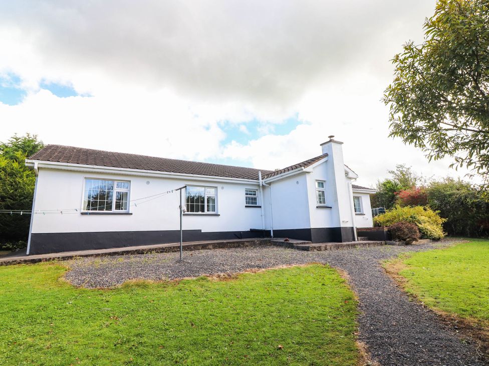 A house with a garden and pathway at Cross Beg Kilmihil, County Clare