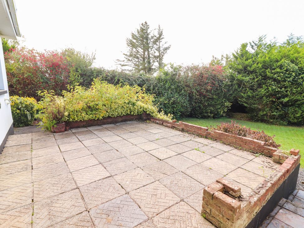 An outdoor area with paving stones and plants at Cross Beg in Kilmihil, County Clare