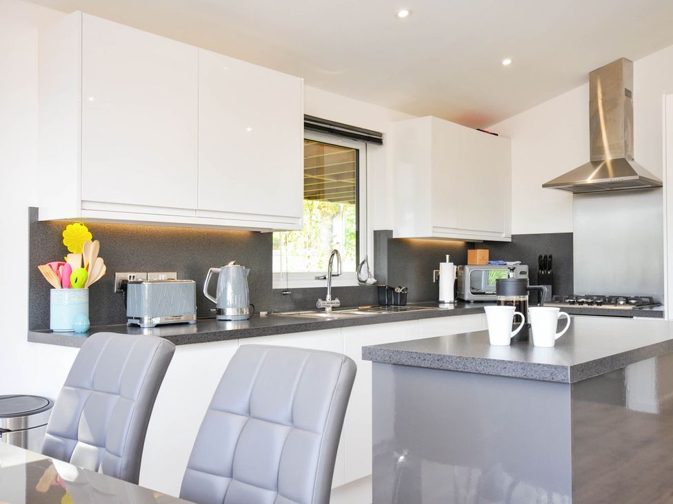 A kitchen with appliances and counter space at 22 Meadow Retreat in Dobwalls