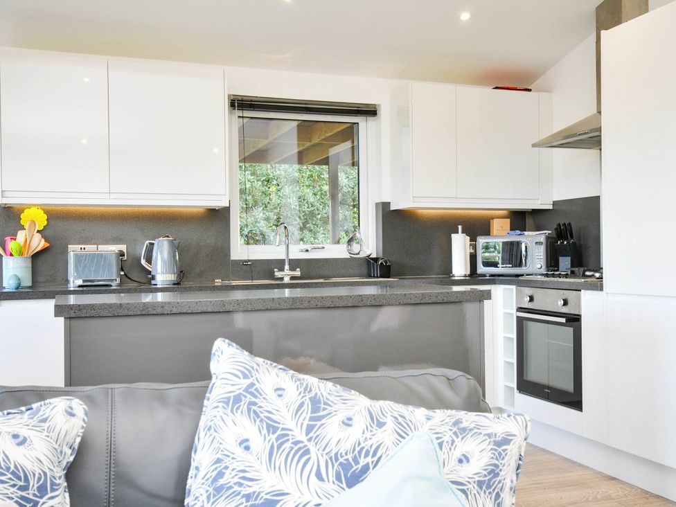 A kitchen with modern appliances at 22 Meadow Retreat in Dobwalls