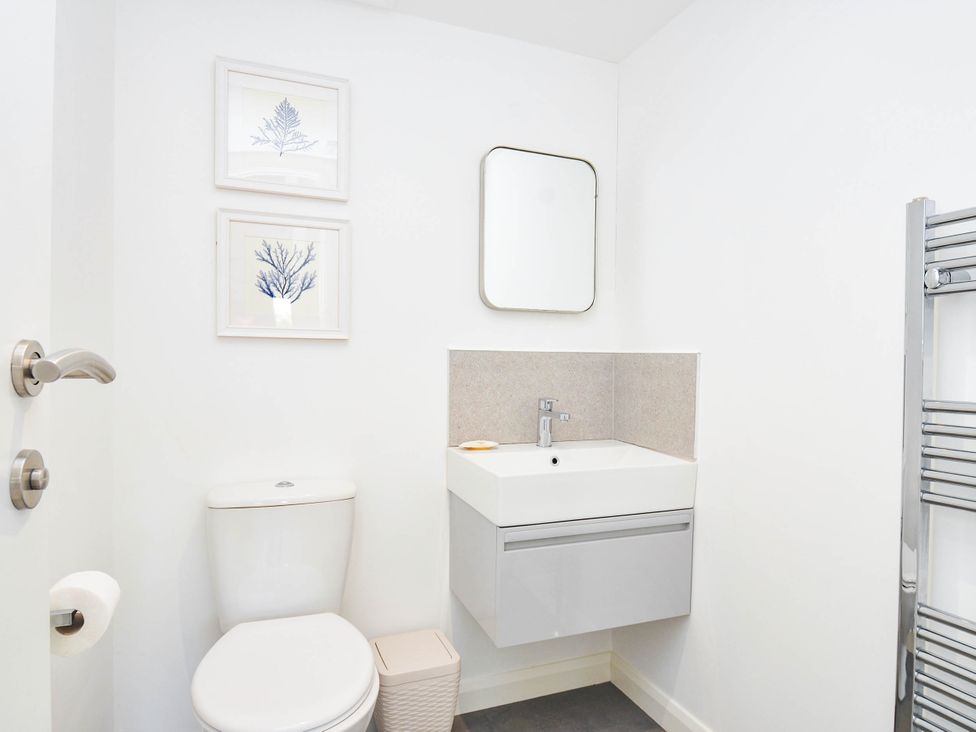 A bathroom with a toilet and sink at 22 Meadow Retreat in Dobwalls