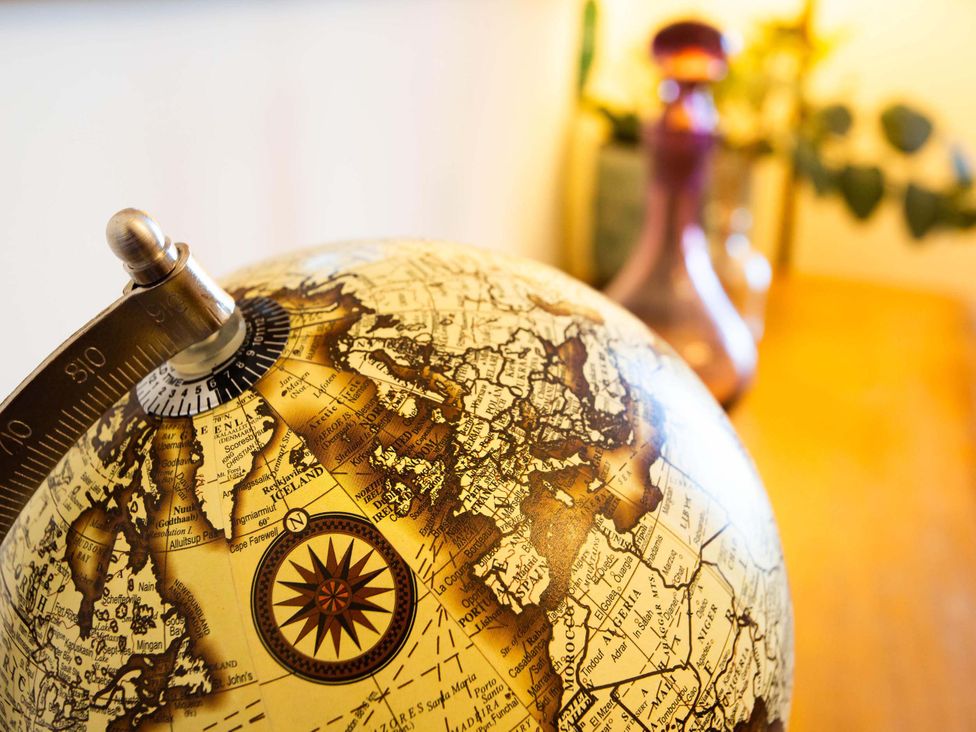 A globe with a compass on a table at Fereneze, Lochranza, Isle Of Arran